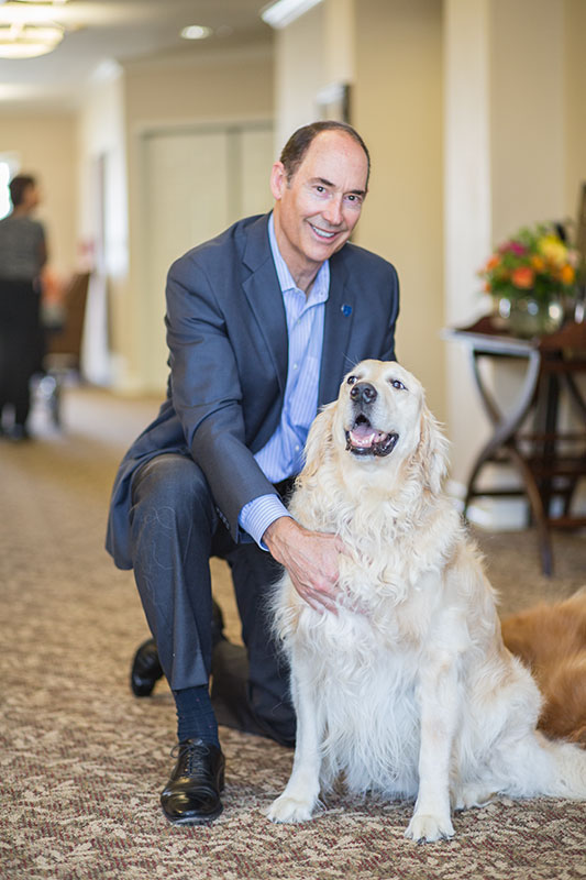 Loren with community dog.